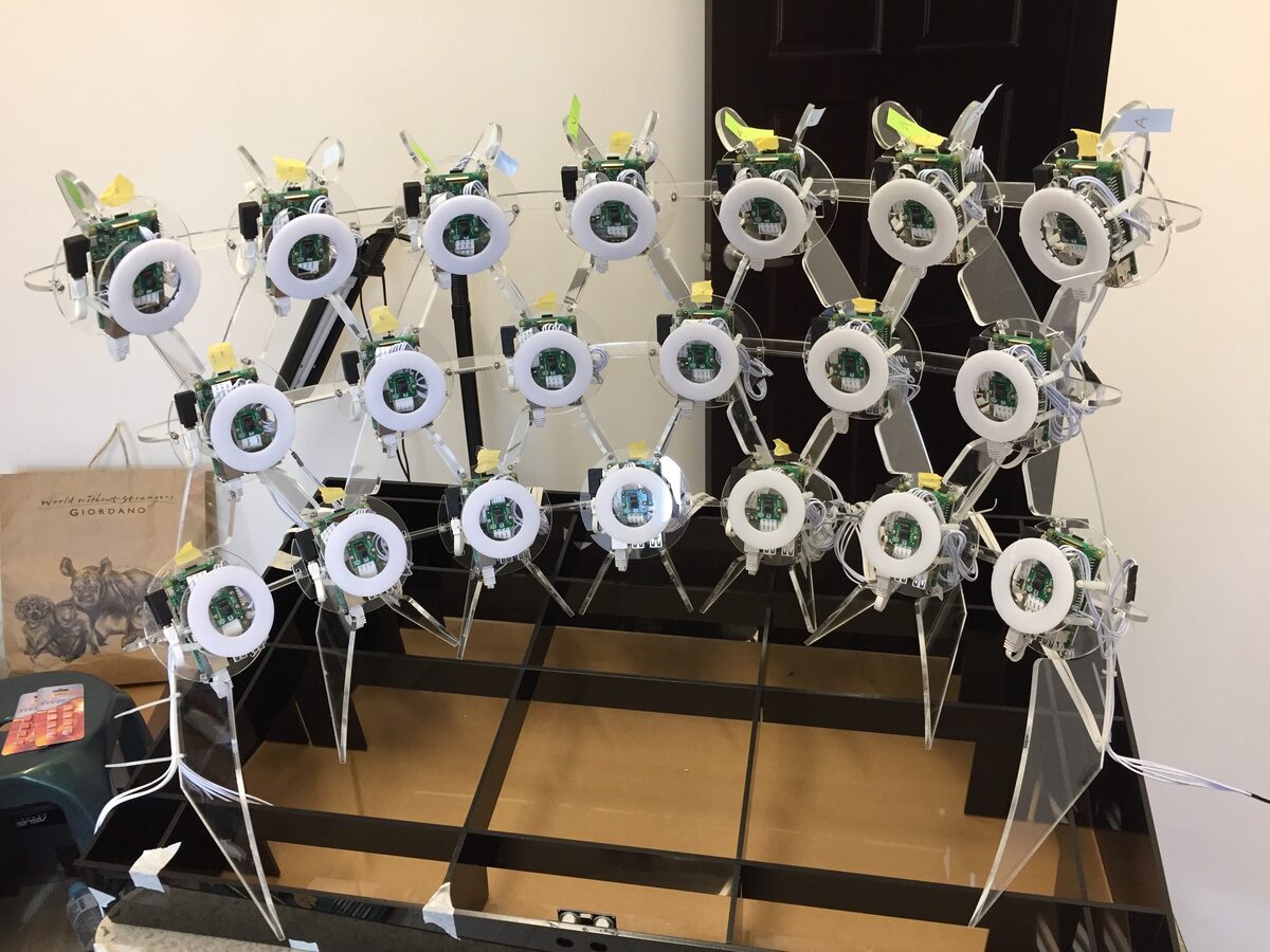 Completed structure — acrylic hoops + Raspberry Pi camera nodes