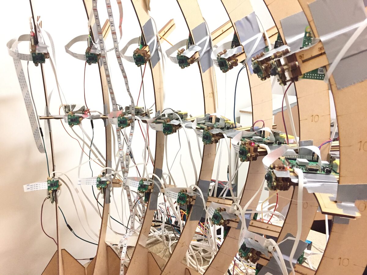 Assembly detail — ribbon cables & PCB mounts on laser-cut frame